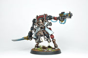 A painted miniature model of a mechanical suit character from the Walker series, featuring a detailed and colorful design with a sword and ornate mechanical details.